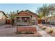 Renovated craftsman bungalow with a welcoming front porch and attractive landscaping at 1815 N Dayton St, Phoenix, AZ 85006