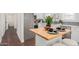 Modern kitchen island with butcher block countertop at 1815 N Dayton St, Phoenix, AZ 85006