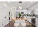 Modern kitchen with white cabinets and a butcher block island at 1815 N Dayton St, Phoenix, AZ 85006