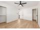 Bright bedroom with wood-look floors and ample closet space at 1817 E Hayward Ave # 3, Phoenix, AZ 85020