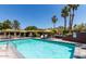 Inviting community pool with lounge chairs and umbrellas at 1817 E Hayward Ave # 3, Phoenix, AZ 85020