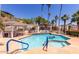 Community pool and spa with surrounding patio furniture at 1817 E Hayward Ave # 3, Phoenix, AZ 85020