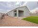 Artificial turf backyard with covered patio at 18972 W Woodlands Ave, Buckeye, AZ 85326