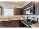 Well-equipped kitchen featuring stainless steel appliances at 18972 W Woodlands Ave, Buckeye, AZ 85326