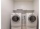 Bright laundry room, complete with washer and dryer at 18972 W Woodlands Ave, Buckeye, AZ 85326