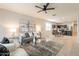 Open floor plan living room and kitchen area at 18972 W Woodlands Ave, Buckeye, AZ 85326