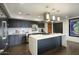 Modern kitchen with island and stainless steel appliances at 200 W Portland St # 817, Phoenix, AZ 85003