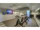 Modern spin studio with multiple bikes and a large screen at 200 W Portland St # 817, Phoenix, AZ 85003