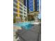 Refreshing pool with surrounding lounge chairs at 200 W Portland St # 817, Phoenix, AZ 85003