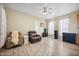 Living area with two leather chairs, and a water dispenser at 201 S Greenfield Rd # 353, Mesa, AZ 85206