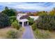 An aerial view of a large house with a long driveway at 2124 E Virginia St, Mesa, AZ 85213