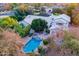 Aerial view of house, pool, and lush landscaping at 2124 E Virginia St, Mesa, AZ 85213