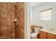 Bathroom with shower, toilet and wooden vanity at 2124 E Virginia St, Mesa, AZ 85213