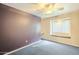 Bedroom with window seat and purple accent wall at 2124 E Virginia St, Mesa, AZ 85213