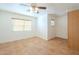 Bright bedroom with tile flooring and window blinds at 2124 E Virginia St, Mesa, AZ 85213