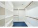 Walk-in closet with ample shelving and hanging space at 2124 E Virginia St, Mesa, AZ 85213