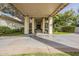 Long driveway leading to a covered entryway with columns at 2124 E Virginia St, Mesa, AZ 85213