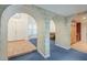 View of entryway with stone archways and tiled floors at 2124 E Virginia St, Mesa, AZ 85213