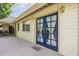 Home exterior showcasing a blue double door entry at 2124 E Virginia St, Mesa, AZ 85213