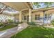 Charming house entrance with covered porch and lush landscaping at 2124 E Virginia St, Mesa, AZ 85213