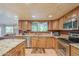 Kitchen with granite countertops and stainless steel appliances at 2124 E Virginia St, Mesa, AZ 85213