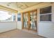 Covered balcony with French doors and a view at 2124 E Virginia St, Mesa, AZ 85213