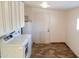 Laundry room with washer, dryer, and ample cabinet storage at 2270 S Apache Dr, Apache Junction, AZ 85120