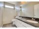 Bathroom with double sinks and a shower/tub combo at 29302 N 126Th Ln, Peoria, AZ 85383