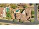 Aerial view of luxury home with pool and manicured landscaping at 3257 N Piedra Cir, Mesa, AZ 85207