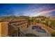 Luxury home with stunning pool and mountain views at sunset at 3257 N Piedra Cir, Mesa, AZ 85207