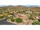 Aerial view of luxury home nestled in a prestigious community with mountain backdrop at 3257 N Piedra Cir, Mesa, AZ 85207