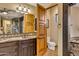 Elegant bathroom with granite vanity, soaking tub, and walk-in shower at 3257 N Piedra Cir, Mesa, AZ 85207