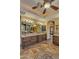 Double vanity bathroom with granite countertops and dark wood cabinets at 3257 N Piedra Cir, Mesa, AZ 85207