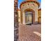 Ornate wrought iron doors and stone entryway at 3257 N Piedra Cir, Mesa, AZ 85207