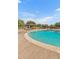 Community pool with covered seating areas at 3257 N Piedra Cir, Mesa, AZ 85207