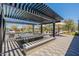 Outdoor kitchen and dining area with pergola at 3751 E Archer Dr, San Tan Valley, AZ 85140