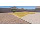 Landscaped backyard with grass and patio at 3751 E Archer Dr, San Tan Valley, AZ 85140