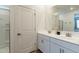 Bathroom with double vanity and a large mirror at 3751 E Archer Dr, San Tan Valley, AZ 85140