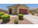 Charming house with a red door and neatly trimmed bushes at 3751 E Archer Dr, San Tan Valley, AZ 85140