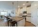 Modern kitchen with white cabinets and a large island at 3751 E Archer Dr, San Tan Valley, AZ 85140