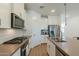 Modern kitchen with stainless steel appliances and an island at 3751 E Archer Dr, San Tan Valley, AZ 85140