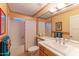 Small bathroom with single vanity, shower/tub combo and mirror at 3755 N 161St Ave, Goodyear, AZ 85395