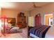 Bedroom with wooden furniture and southwest themed decor at 3755 N 161St Ave, Goodyear, AZ 85395