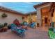 Inviting courtyard with fountain, seating area, and lush desert plants at 3755 N 161St Ave, Goodyear, AZ 85395