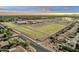 Aerial view of community near school and sports facilities at 3829 E Sawtooth Dr, Chandler, AZ 85249