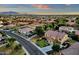 Aerial view of house and neighborhood at sunset at 3829 E Sawtooth Dr, Chandler, AZ 85249