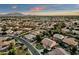 Aerial view of house and neighborhood at sunset at 3829 E Sawtooth Dr, Chandler, AZ 85249