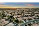 Aerial view showing house, neighborhood, and mountain range at 3829 E Sawtooth Dr, Chandler, AZ 85249