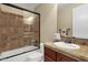 Updated bathroom with glass shower door, tile flooring and a vanity at 3829 E Sawtooth Dr, Chandler, AZ 85249