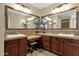 Elegant bathroom with dual vanities, a large mirror, and plenty of storage at 3829 E Sawtooth Dr, Chandler, AZ 85249